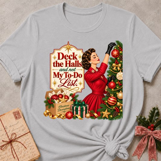 Athletic Heather relaxed fit tee with Deck the Halls and not My To-Do List lettering, a vintage woman in red trimming an ornament-covered tree
