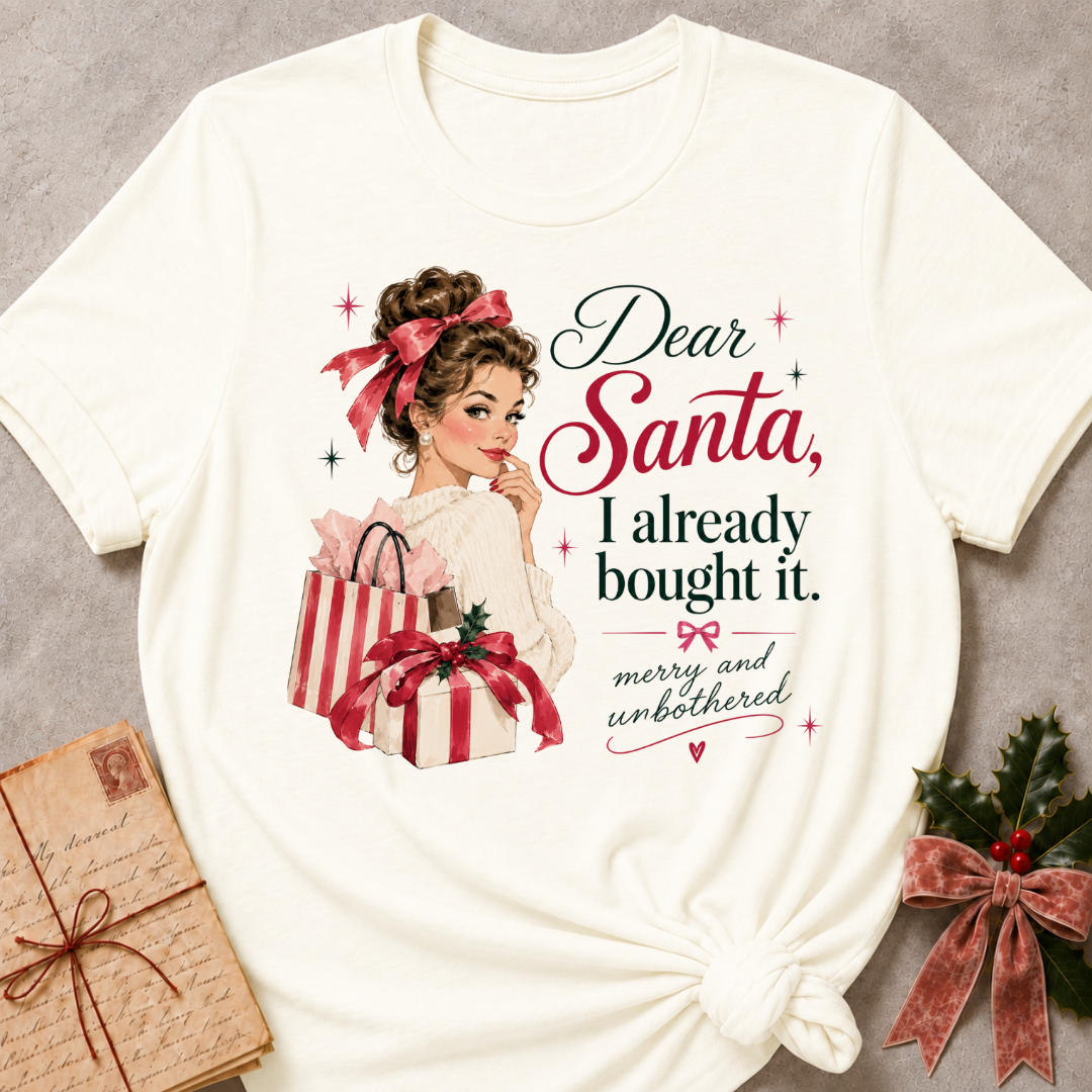 Vintage White relaxed fit tee with Dear Santa, I already bought it lettering, a vintage holiday shopper with striped gift boxes and red bows