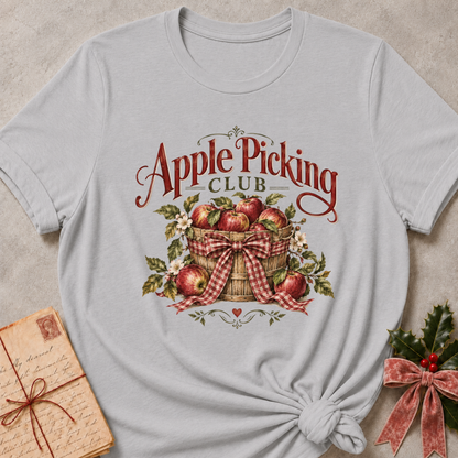 Athletic Heather relaxed fit tee with an Apple Picking Club basket of red apples, blossoms and a gingham bow