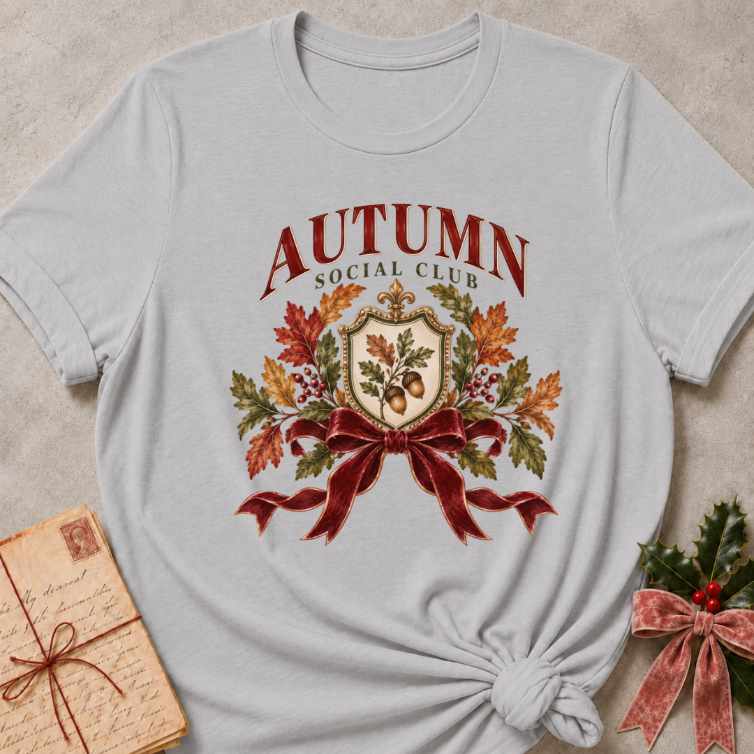 Athletic Heather relaxed fit tee with an Autumn Social Club crest, oak leaves, acorns and a burgundy bow