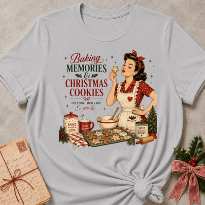 Athletic heather grey relaxed fit tee with a retro baker and a tray of Christmas cookies