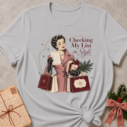 Athletic Heather relaxed fit tee with Checking My List in Style lettering, a vintage woman in a rose coat holding her list and burgundy shopping bags