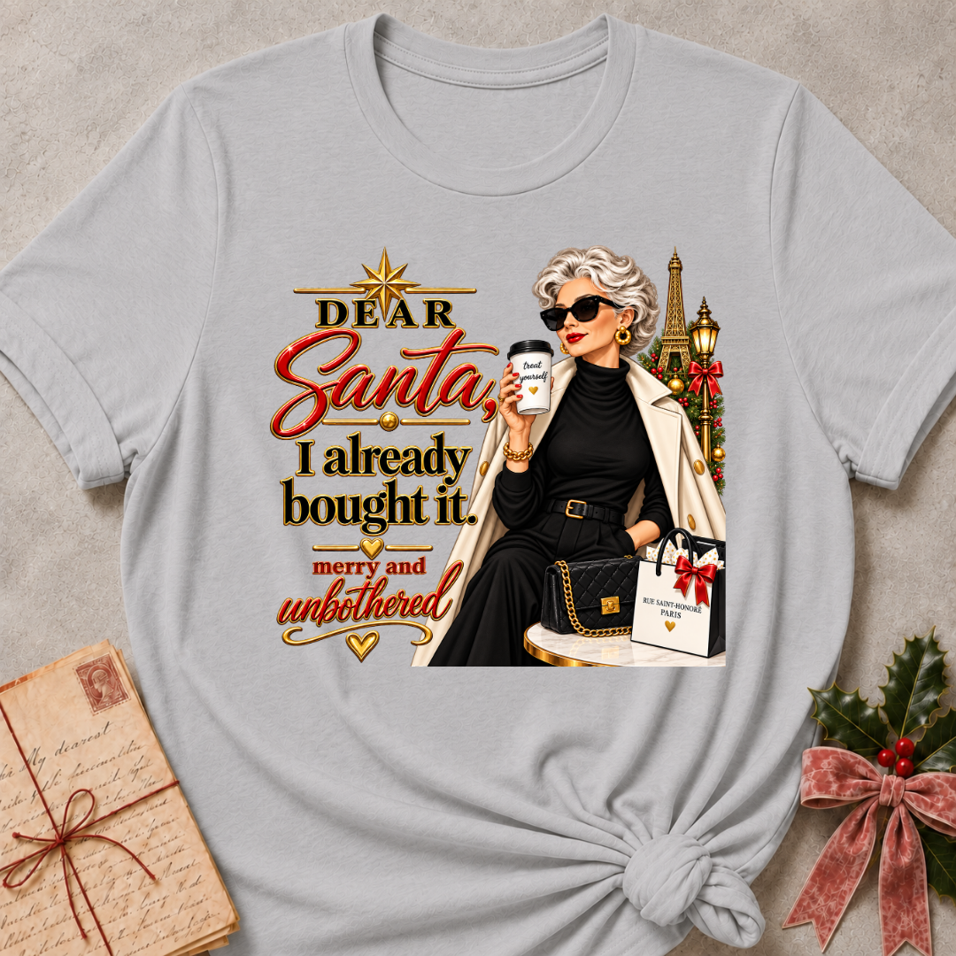 Athletic Heather relaxed fit tee with Dear Santa, I already bought it lettering, a merry and unbothered shopper in sunglasses with an iced coffee and gift bags