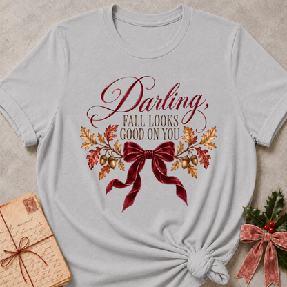 Athletic heather grey women's relaxed tee with a Darling, Fall Looks Good On You script design with a burgundy velvet bow, oak leaves, and acorns