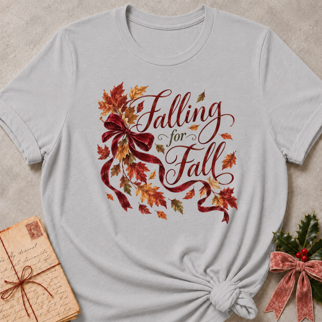 Athletic Heather relaxed fit tee with Falling for Fall script, a burgundy velvet bow and swirling autumn leaves