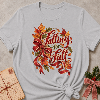 Athletic Heather relaxed fit tee with Falling for Fall script, an oversized burgundy bow and swirling autumn leaves