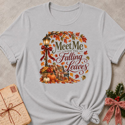 Athletic Heather relaxed fit tee with Meet Me Under the Falling Leaves lettering, a glowing lamppost, park bench, pumpkins and drifting maple leaves