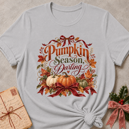 Athletic heather grey women's relaxed tee with a Pumpkin Season, Darling script design with heirloom pumpkins, autumn leaves, and burgundy ribbon bows