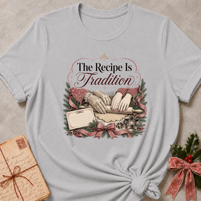 Athletic heather grey relaxed fit tee with hands rolling dough and The Recipe Is Tradition lettering
