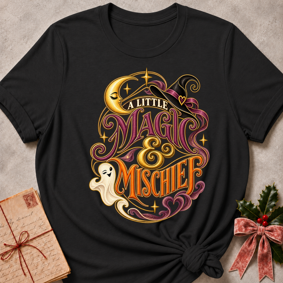 Dark Grey Heather A Little Magic & Mischief tee with a smiling ghost, sleepy crescent moon and witch's hat in gold and plum