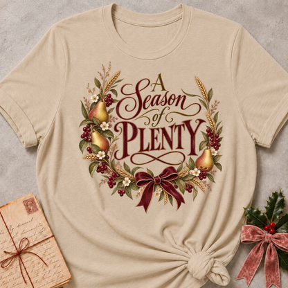 Heather Stone relaxed fit tee with A Season of Plenty script, golden pears, wheat, berries and a burgundy bow