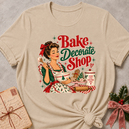Heather stone relaxed fit tee with a winking retro baker and Bake Decorate Shop lettering
