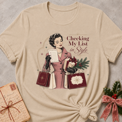 Heather Stone relaxed fit tee with Checking My List in Style lettering, a vintage woman in a rose coat holding her list and burgundy shopping bags
