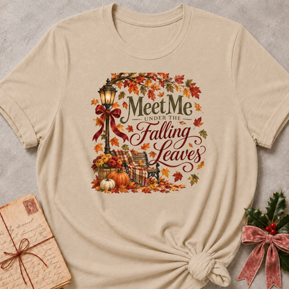 Heather Stone relaxed fit tee with Meet Me Under the Falling Leaves lettering, a glowing lamppost, park bench, pumpkins and drifting maple leaves