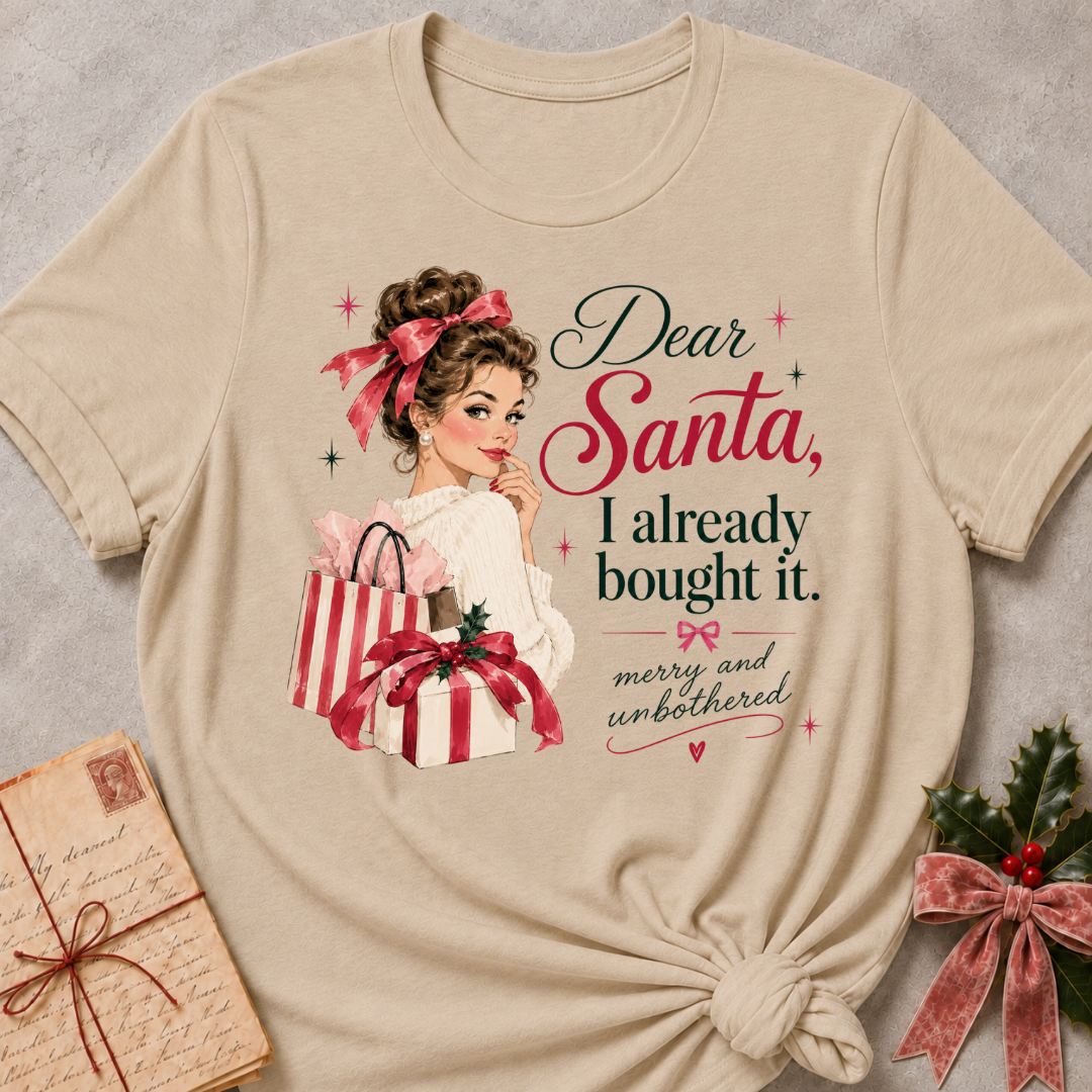 Heather Stone relaxed fit tee with Dear Santa, I already bought it lettering, a vintage holiday shopper with striped gift boxes and red bows