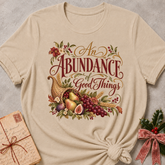 Heather Stone relaxed fit tee with An Abundance of Good Things script and a woven cornucopia of pears, grapes, figs, wheat and autumn flowers