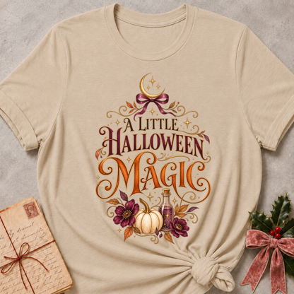Heather Stone A Little Halloween Magic tee with a velvet bow, crescent moon, white pumpkin and plum blooms