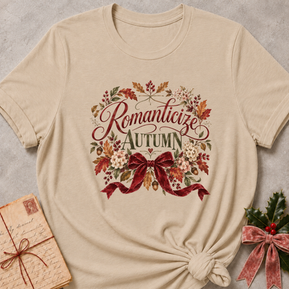 Heather Stone relaxed fit tee with Romanticize Autumn script lettering, autumn leaves, cream blooms and a burgundy velvet bow