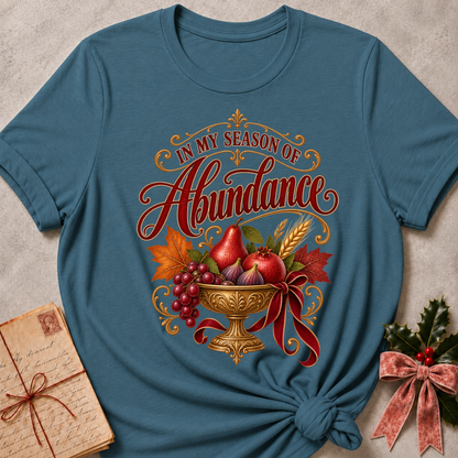Heather Stone relaxed fit tee with In My Season of Abundance script and an ornate golden bowl of pears, pomegranates, figs, grapes and wheat with a ruby bow