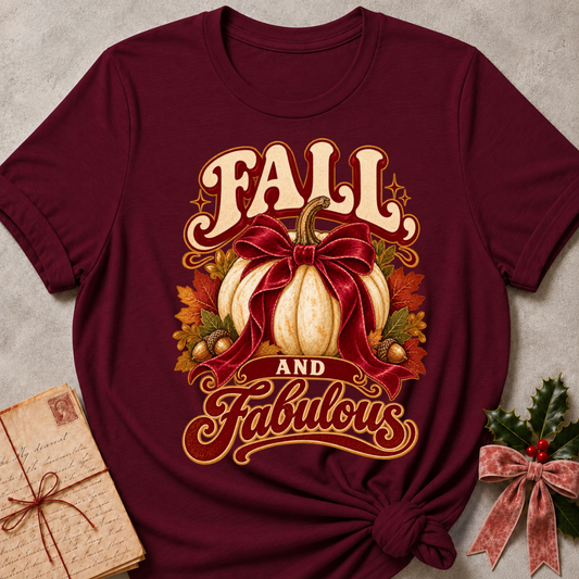 Maroon relaxed fit tee with a white pumpkin, burgundy bow, golden acorns and Fall and Fabulous lettering