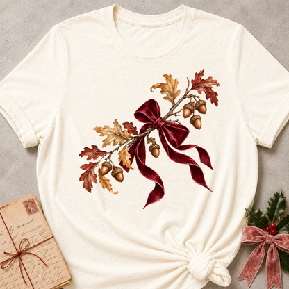 Natural relaxed fit tee with a cluster of acorns, oak leaves and a soft plaid bow