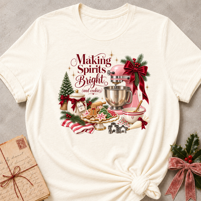 Natural cream relaxed fit tee with a vintage Christmas baking scene and Making Spirits Bright lettering