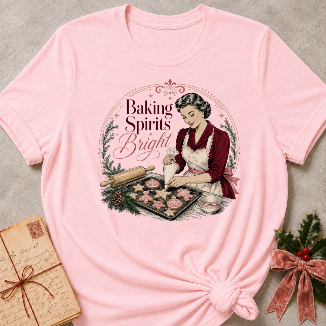 Soft pink relaxed fit tee with a vintage baker piping Christmas cookies