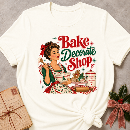 Vintage white relaxed fit tee with a winking retro baker and Bake Decorate Shop lettering