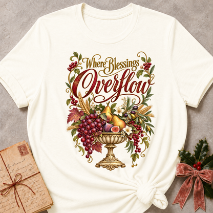 Vintage White relaxed fit tee with Where Blessings Overflow script and a golden urn of grapes, pears, figs and wheat